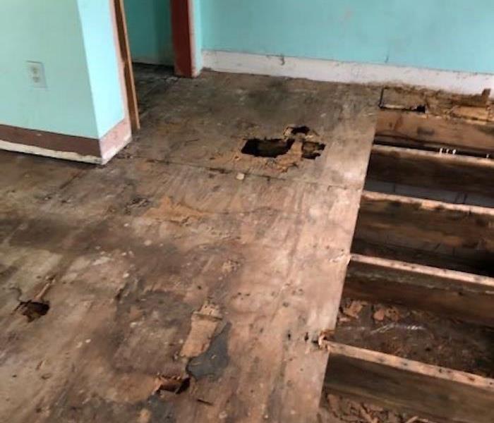 Home with partially removed flooring