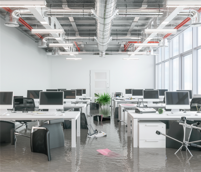flooded office with furniture floating around