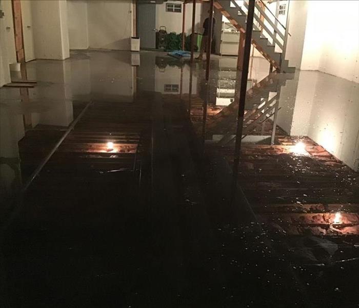flooded basement reflecting water